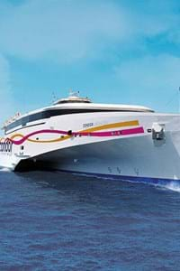 condor liberation ferry on blue sea with blue sky in background