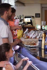 family ordering at horizon bar onboard condor lliberation