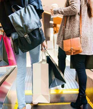 shopping people in the uk at shopping centre