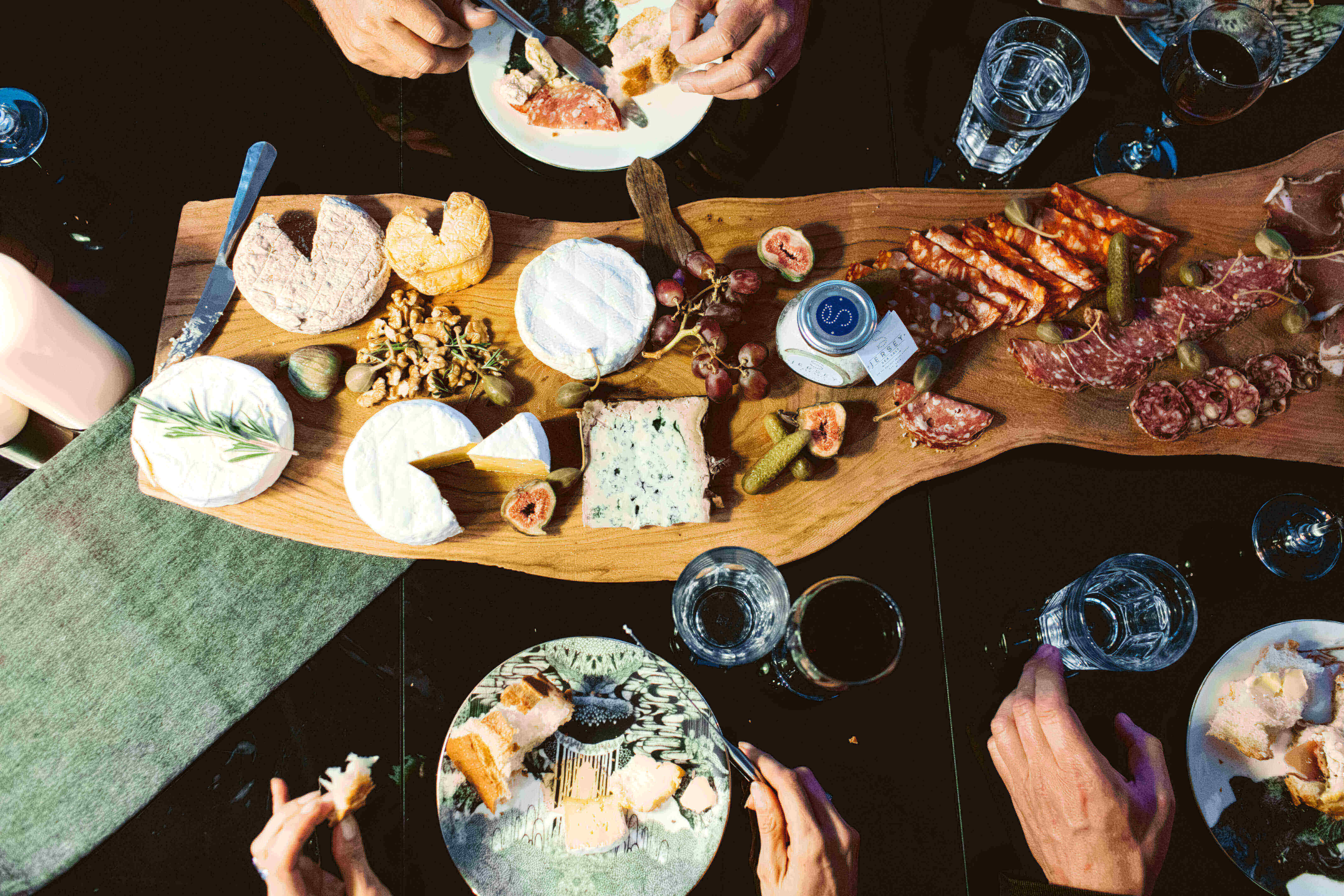 a platter of food on a wooden board in jersey channel islands