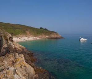 blue sea and coastline of belvoir bay in herm channel islands
