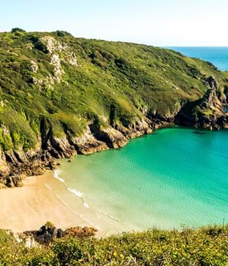 small bay with gold sands and blue sea