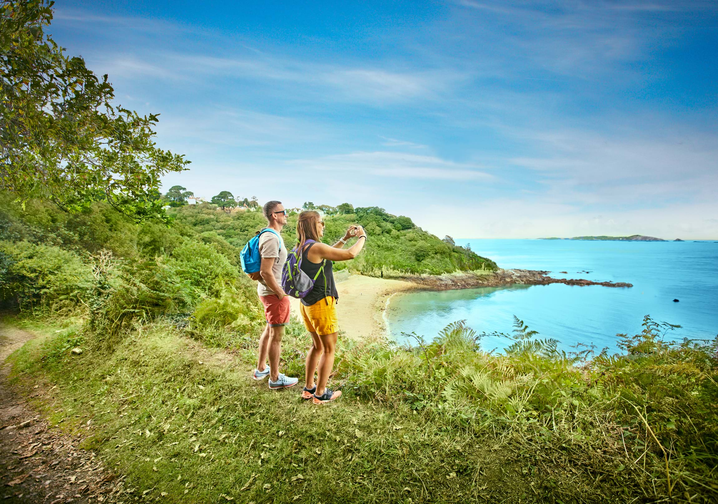 Taking a photo above Fermain Bay.jpg