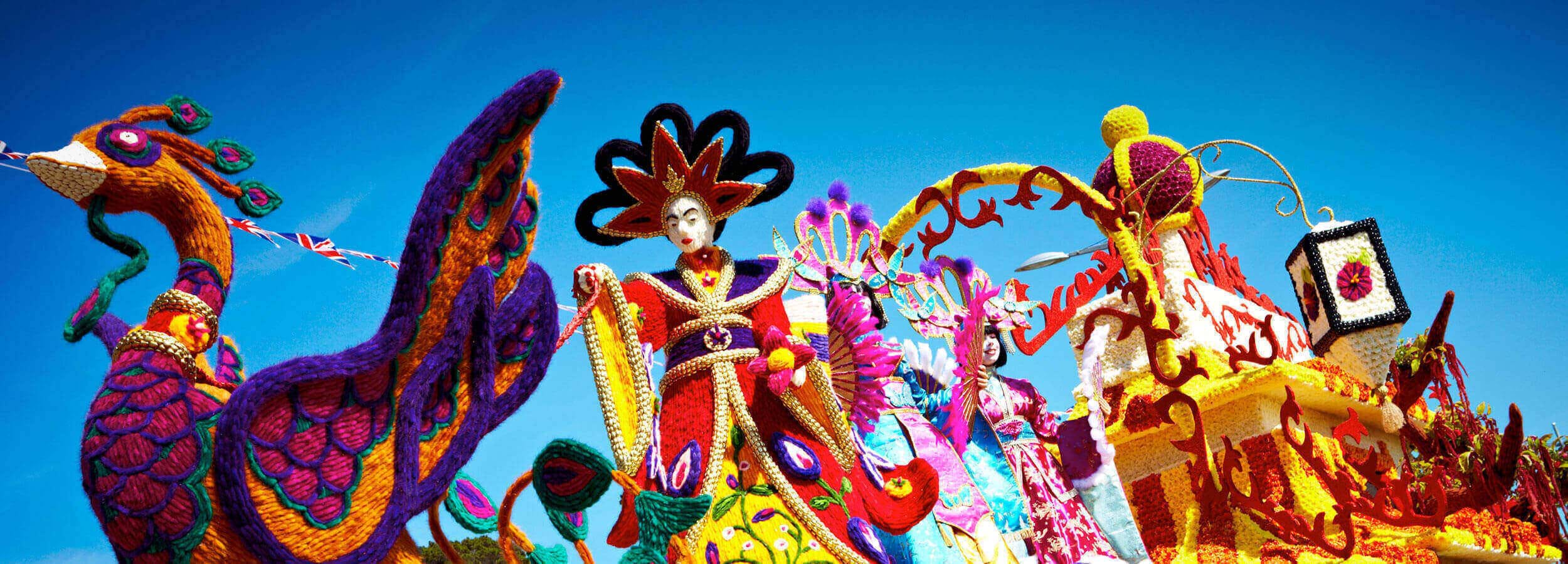 bright colours in the parade for the battle of flowers jersey