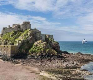 elizabeth castle in jersey with blue sea in background