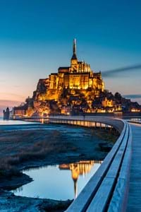 mont st michael in normandy with dark lit sky